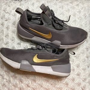 Size 6 grey and gold Nike tennis shoes